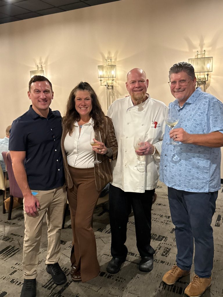 Guests and the chef at a SURV Five Course Dinner & Wine Pairing in Easton, PA